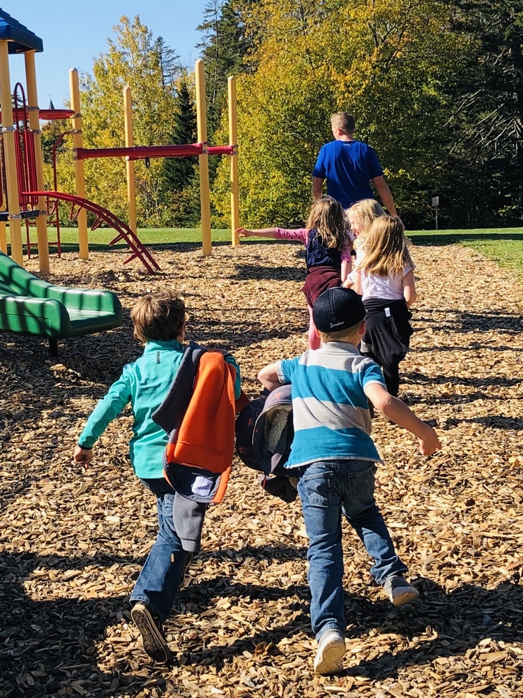 Children playing outside on playground