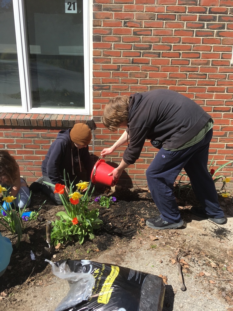 7th graders planting a garden