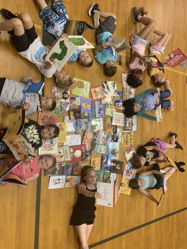 Students enjoying a bunch of books